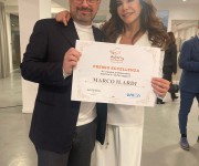 marco ilardi con emanuela folliero col premio autori del sapore 2024