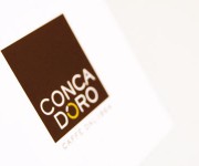 Caffè conca d'oro:  Progettazione del nuovo marchio e di tutta l'immagine coordinata. La lettera 