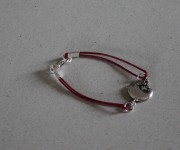 bracciale cordoncino con connettore uccellino