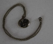 collana bronzo con pendente ingranaggi orologio